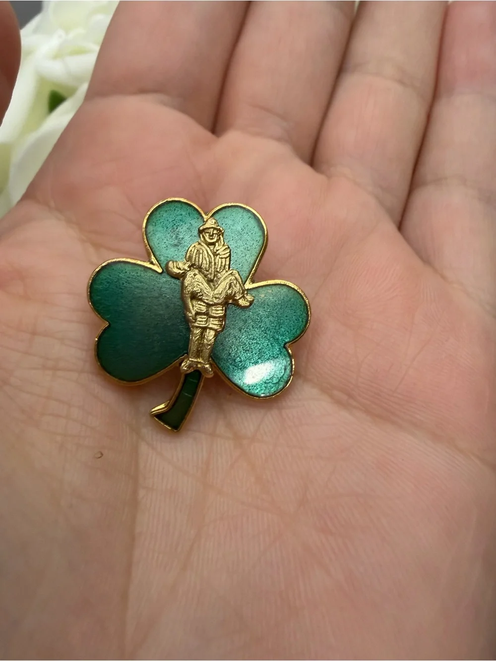Vintage Green Shamrock Enamel Pin with Gold-tone Rescue Figure